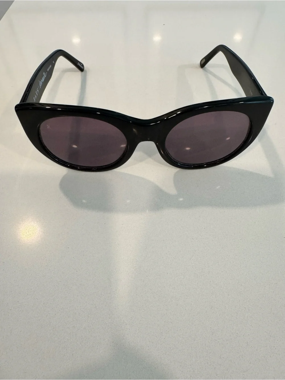 RAEN Black Round Sunglasses with Dark Smoke Lenses